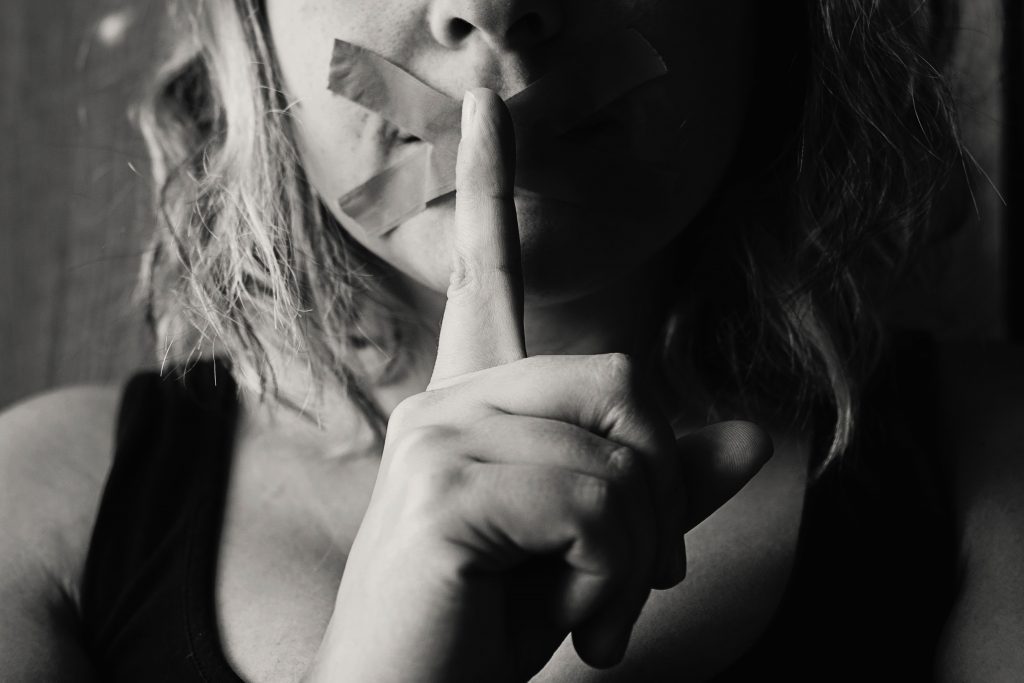 Dirty secrets swept under the rug 5 fingers on lips