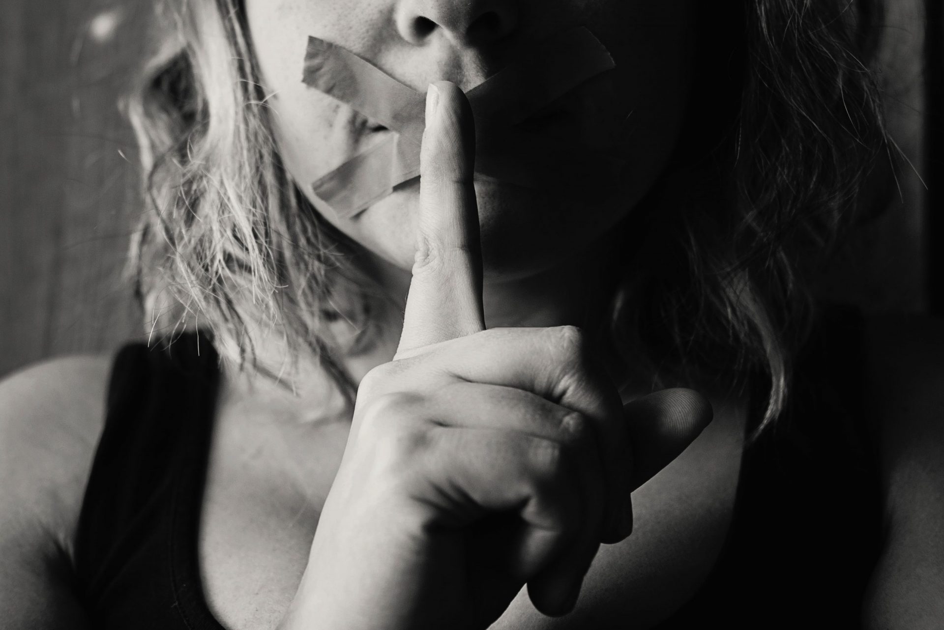 fingers on lips