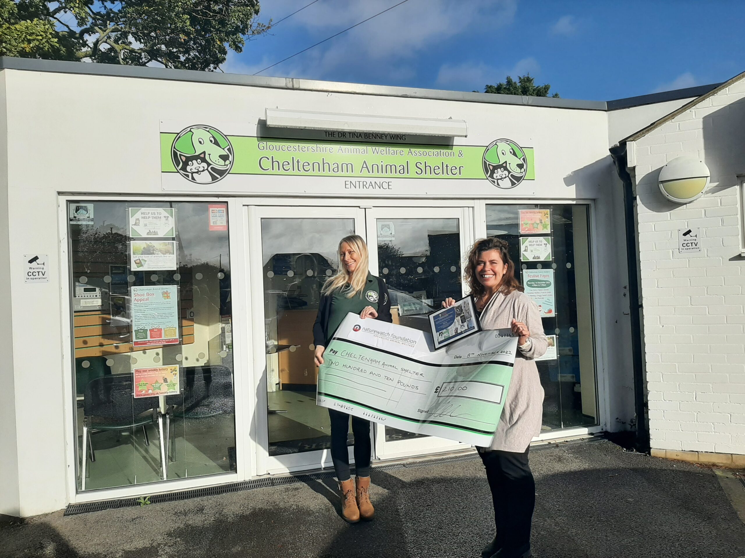 What's new 16 Sarah Carr CEO of Naturewatch Foundation presenting cheque to Cheltenham Animal Shelter