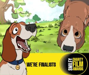 Two cartoon style beagle dogs on a park background, one dog (Toby) happy and bright, the other dog (43) looking sad and darker. The Smiley Charity Film awards logo sits at the bottom of the image with the text "We're Finalists" on a yellow strip.