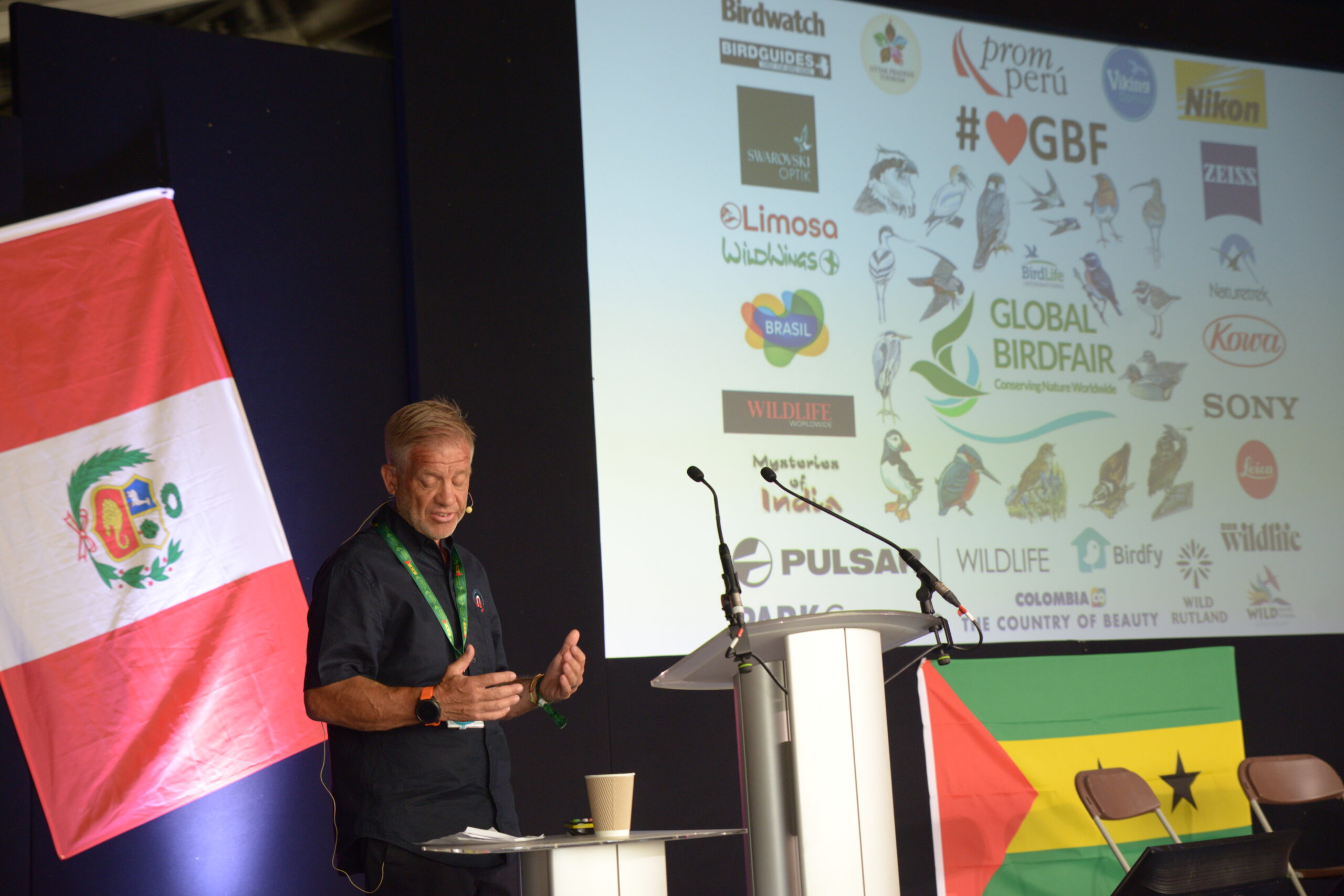 Naturewatch Foundation Targets Global Birdfair 2026 1 Jim on the stage giving a talk at Birdfair.