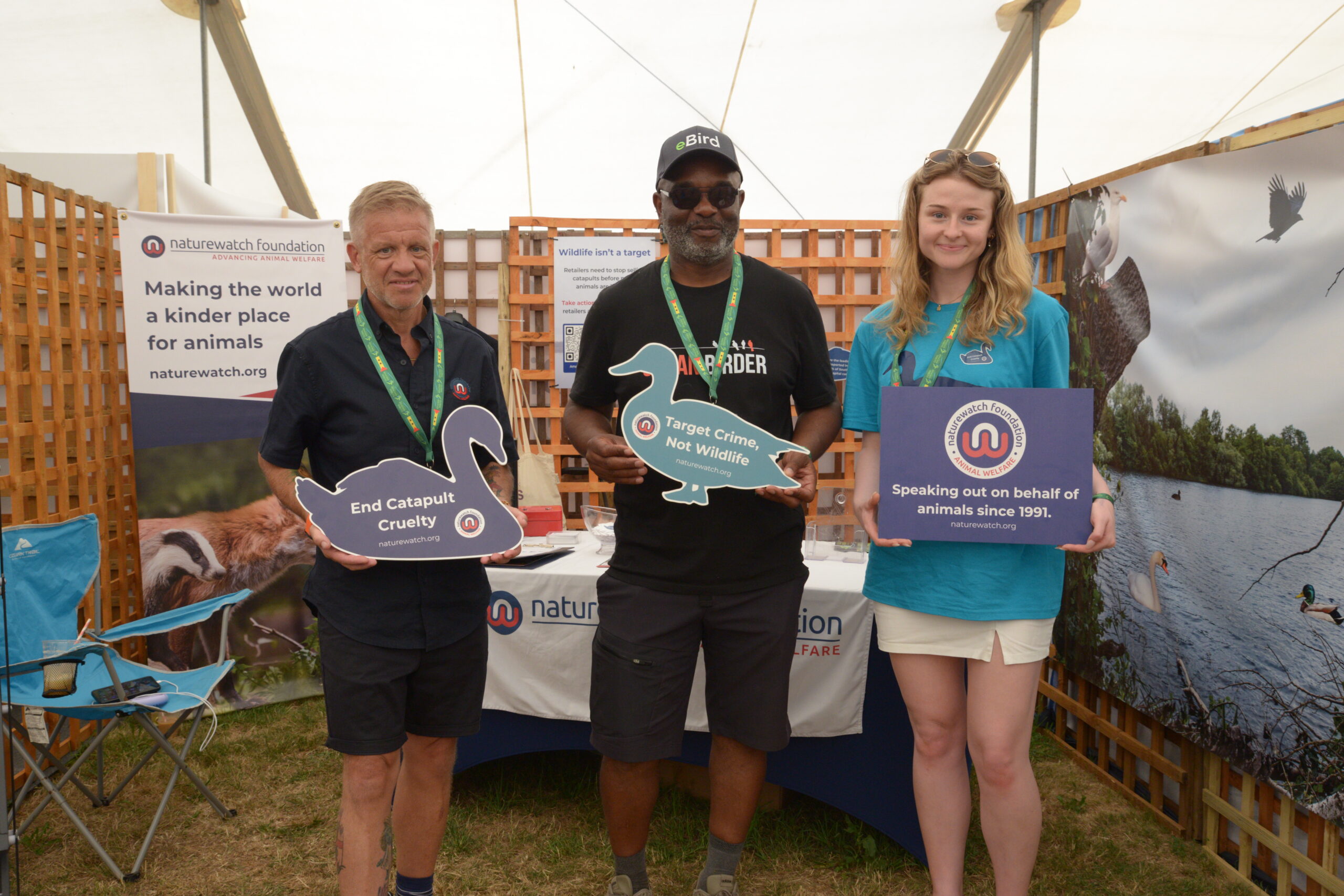Jim and Eve at Birdfair with David Lindo.