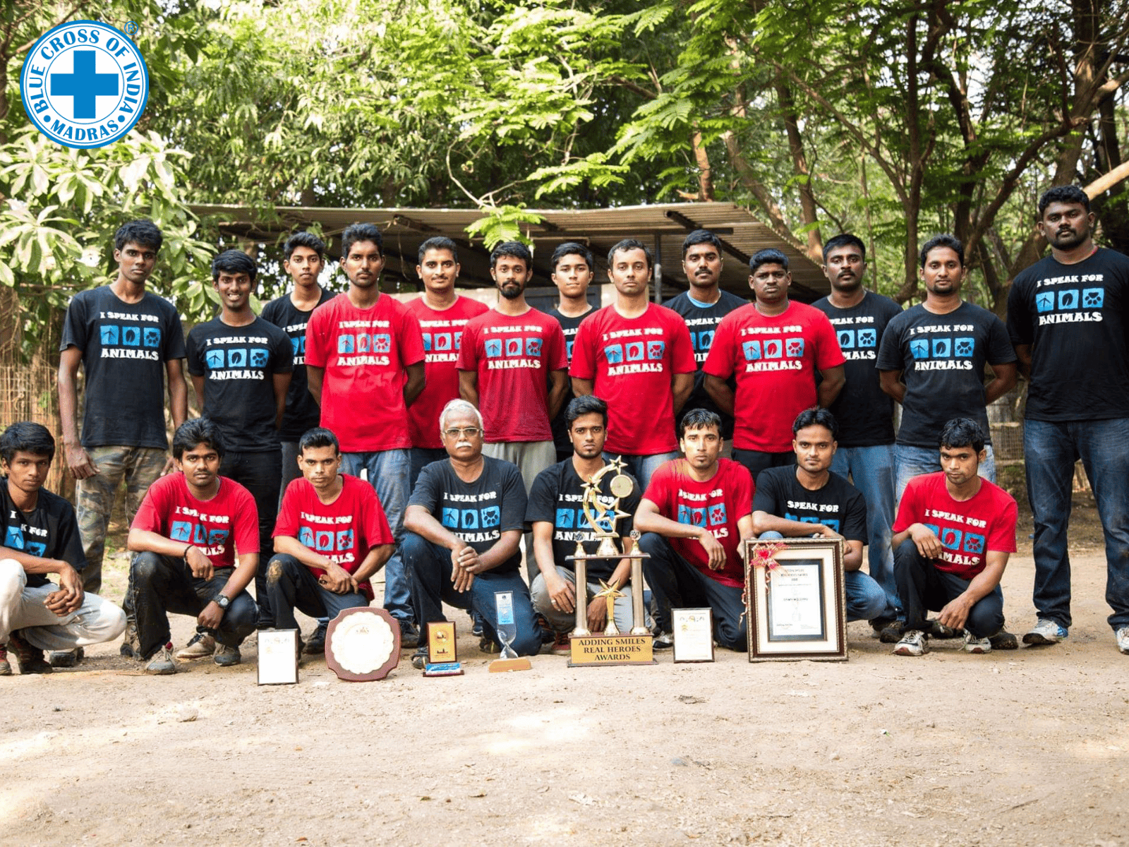 Meet the 2026 World Animal Day Grant Winners 1 Blue Cross of India’s disaster response team posing together outdoors, wearing “I Speak for Animals” T-shirts and holding awards and trophies.