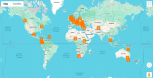 A world map showing World Animal Day events taking place across the globe, with orange markers highlighting where registered events are located. 