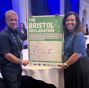 Sarah and Jim holding the Bristol Declaration board.